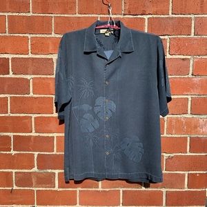 TOMMY BAHAMA’s Hawaiian shirt.